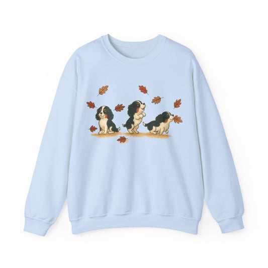 Tricolor Cavalier Chasing Leaves Sweatshirt