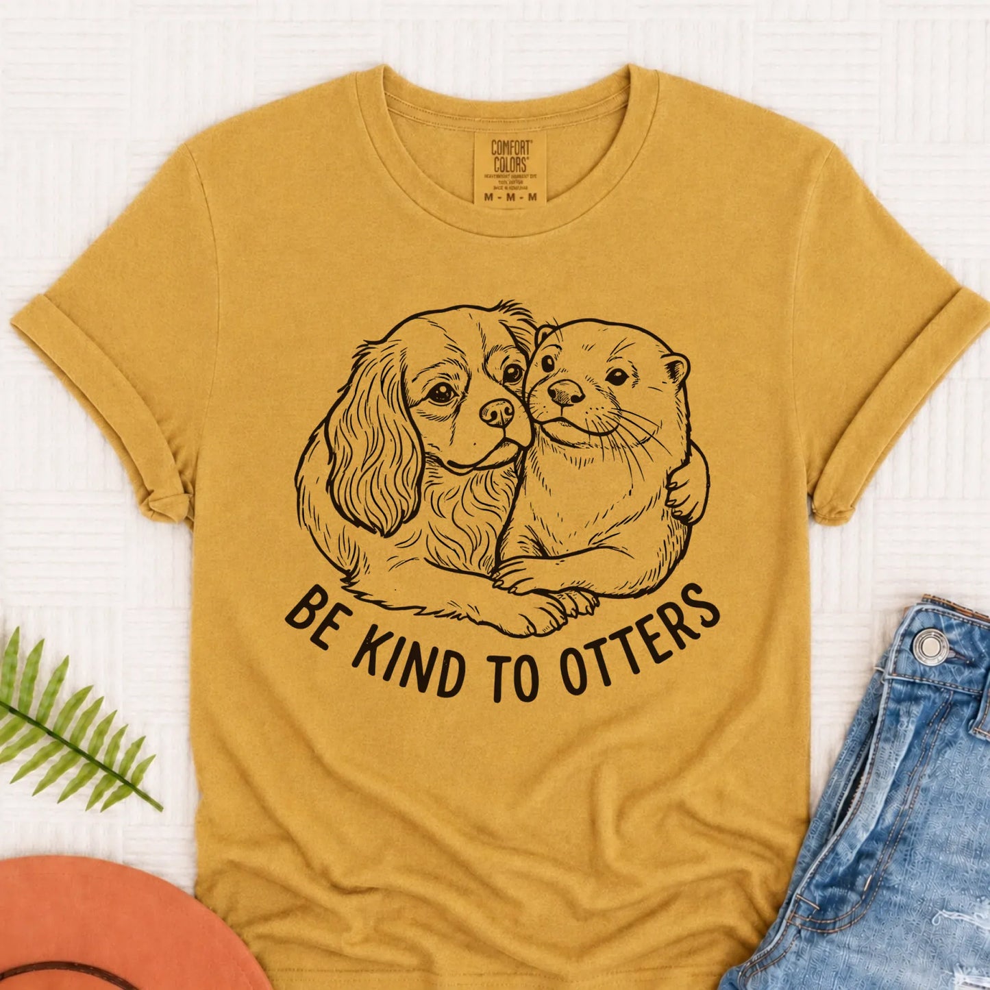 Cavalier Kind to Otters Unisex TShirt Mustard