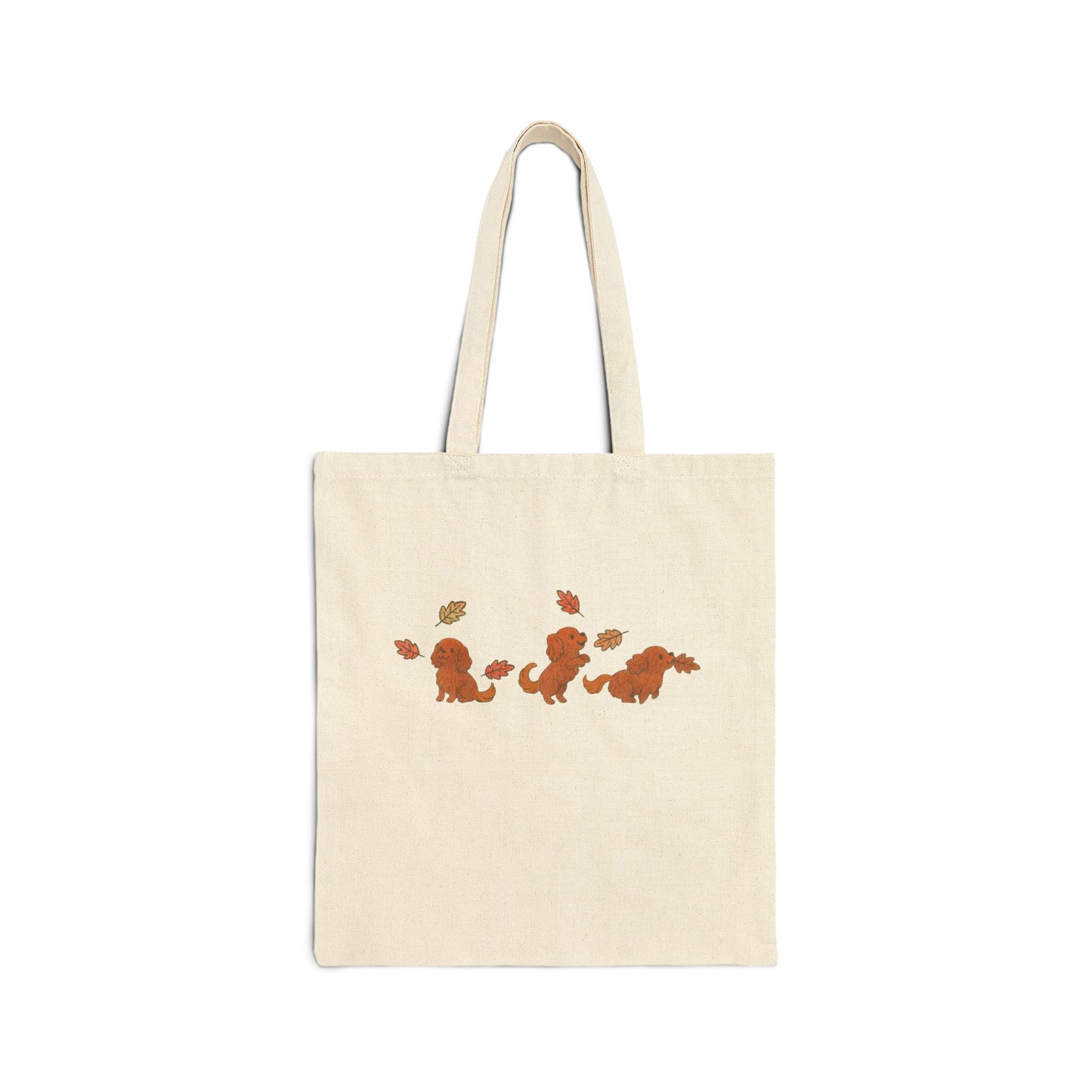 Ruby Cavalier Chasing Leaves Tote Bag