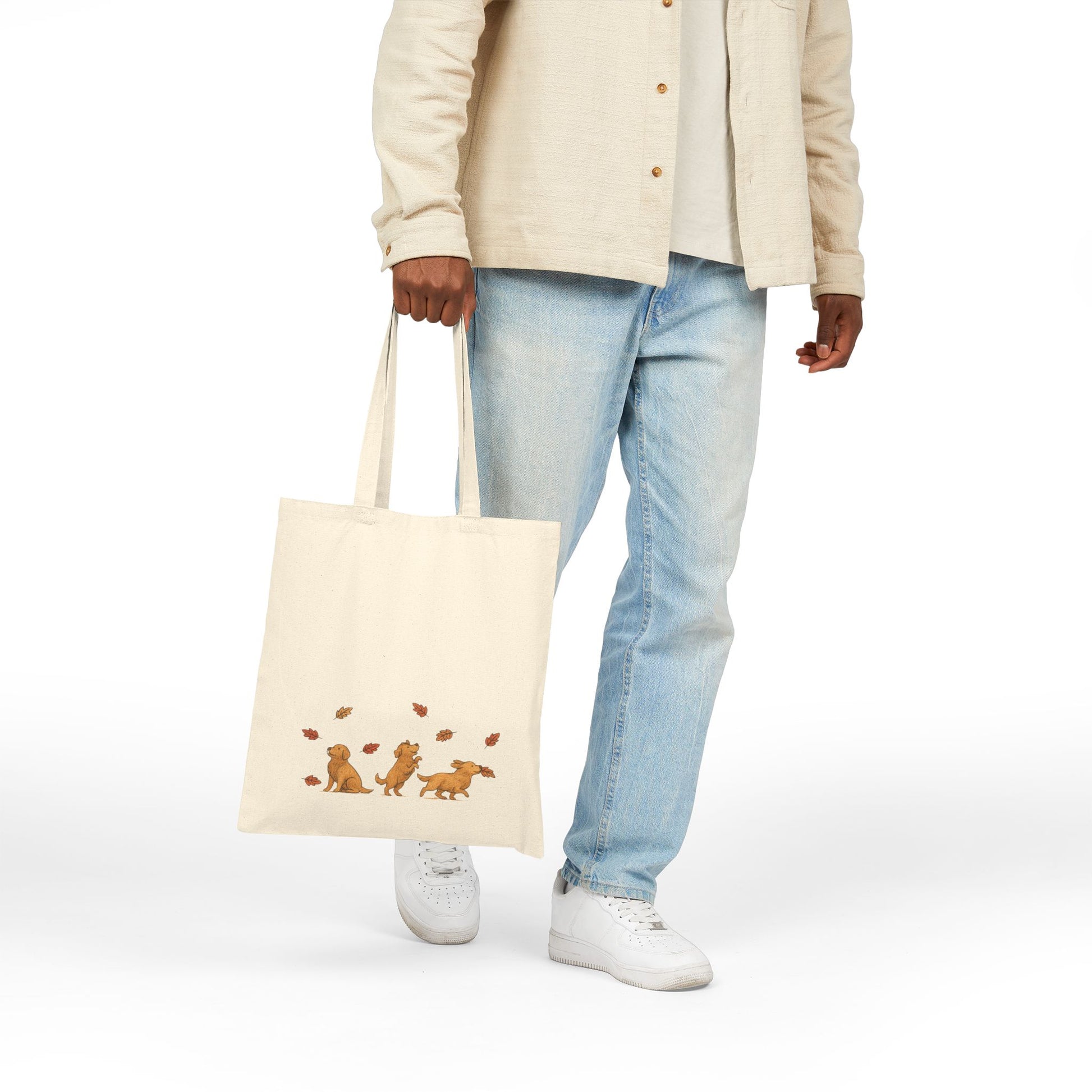 Golden Retriever Chasing Leaves Tote Bag