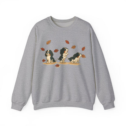 Tricolor Cavalier Chasing Leaves Sweatshirt