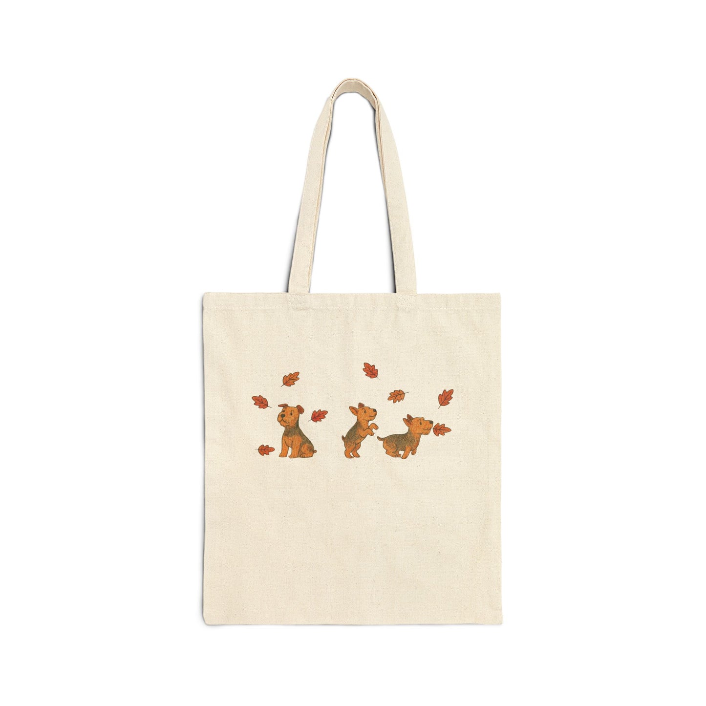 Airedale Terrier Chasing Leaves Tote Bag