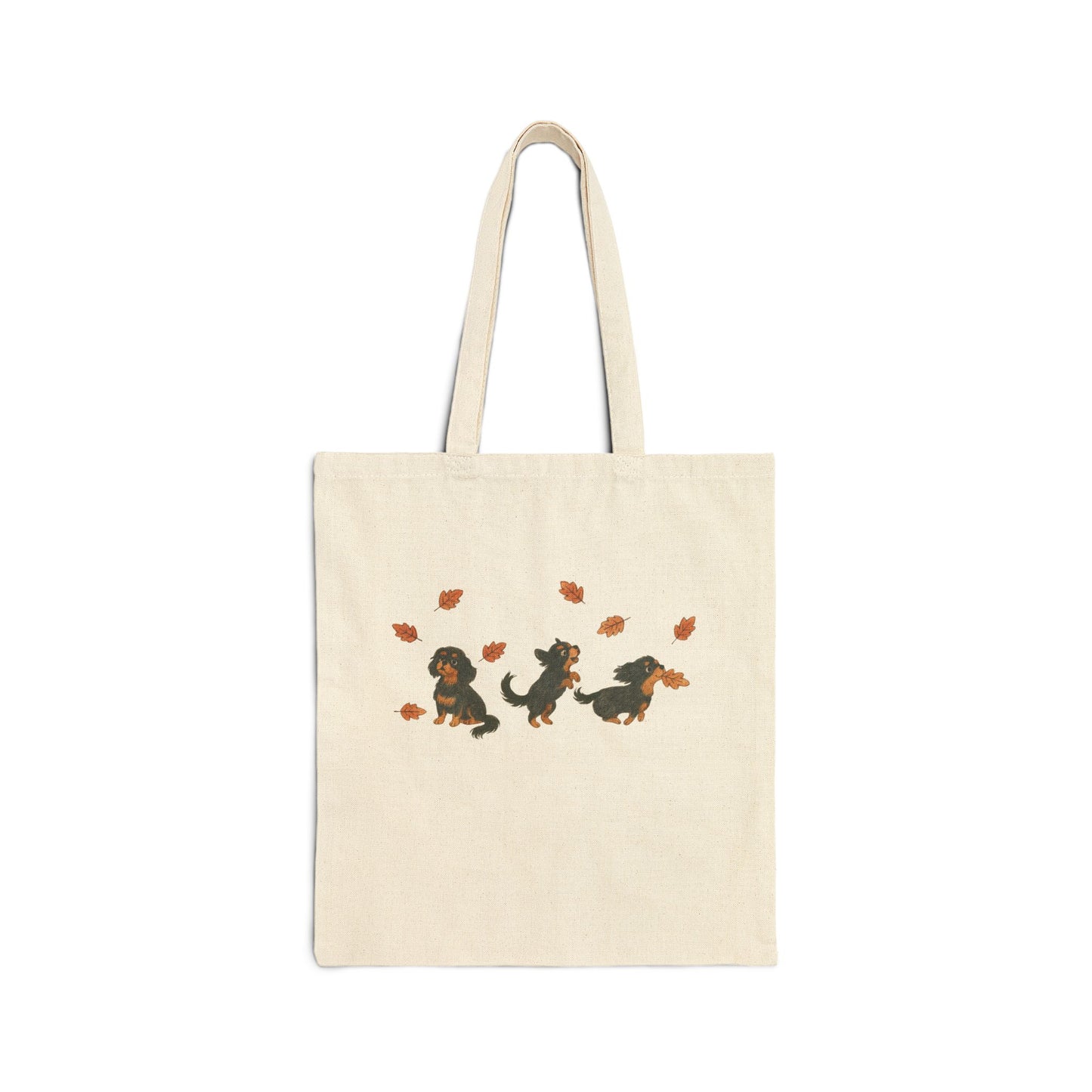 Black Tan Cavalier Chasing Leaves Tote Bag