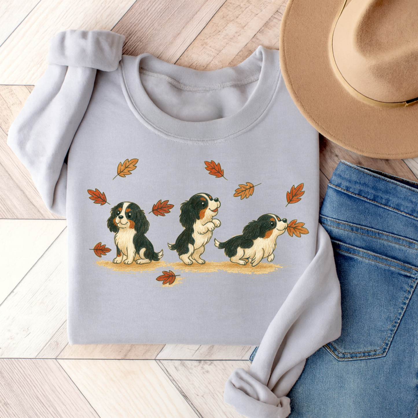 Tricolor Cavalier Chasing Leaves Sweatshirt Ash