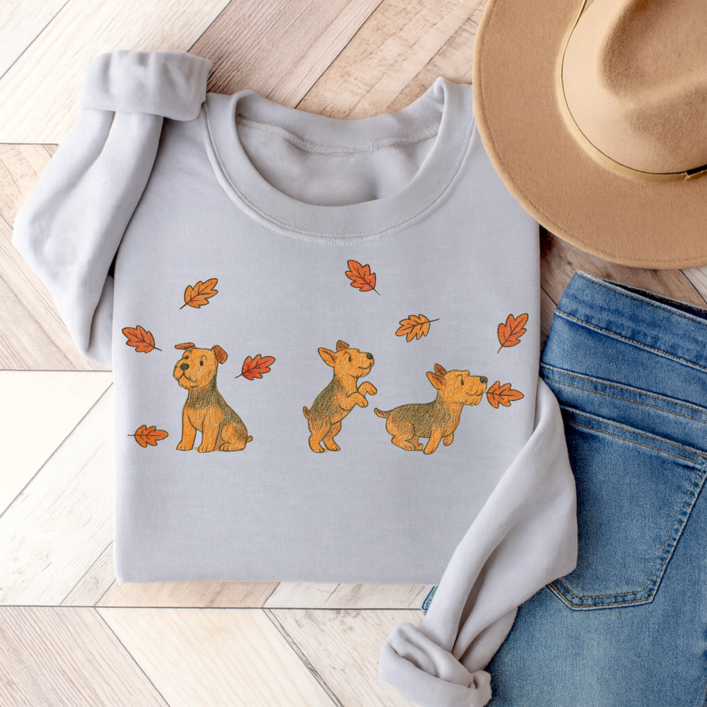 Airedale Terrier Chasing Leaves Sweatshirt Ash