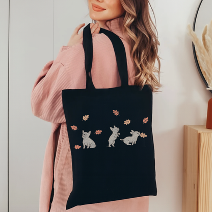 Black French Bulldog Chasing Leaves Tote Bag Black 15" x 16"