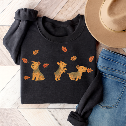 Airedale Terrier Chasing Leaves Sweatshirt Dark Heather