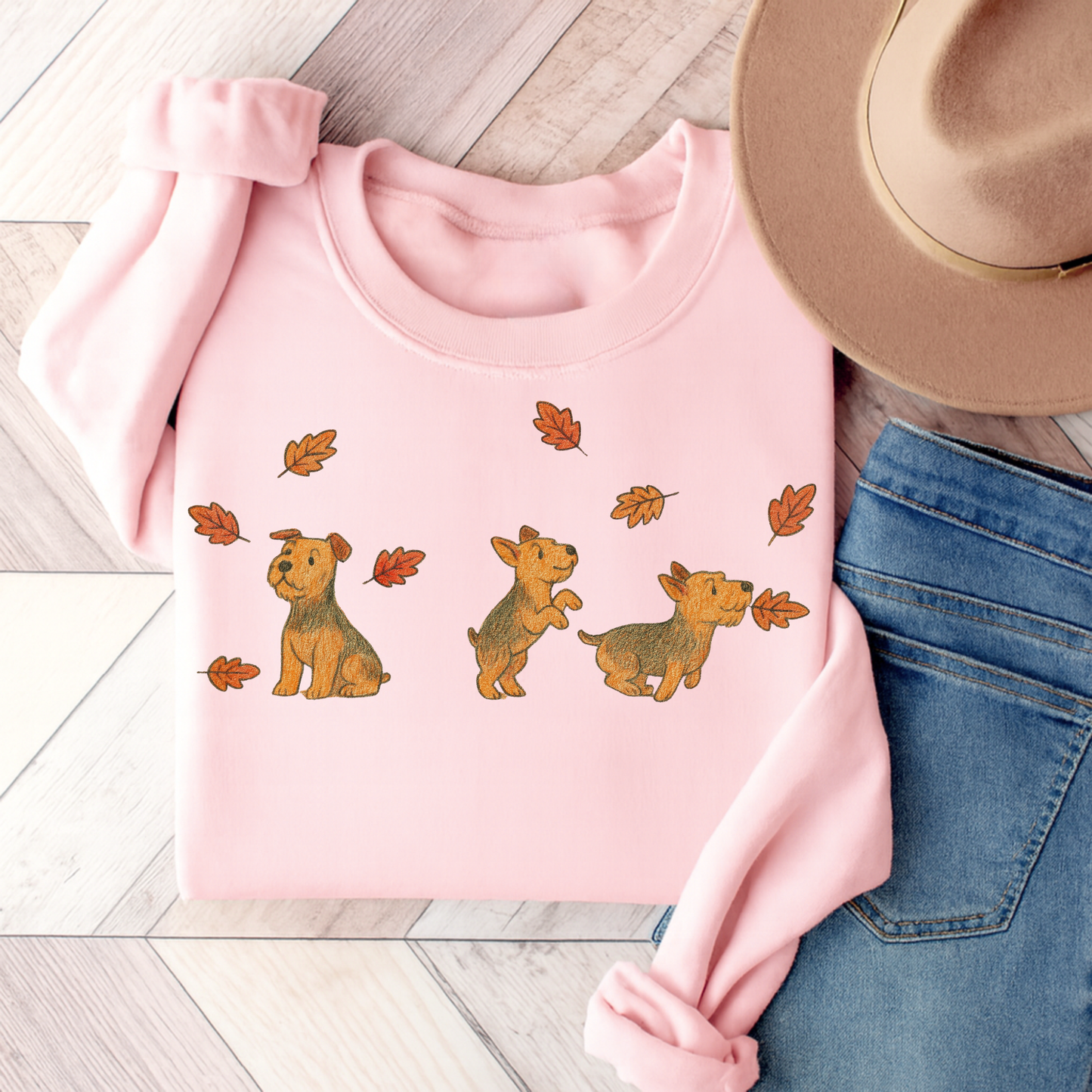 Airedale Terrier Chasing Leaves Sweatshirt Light Pink