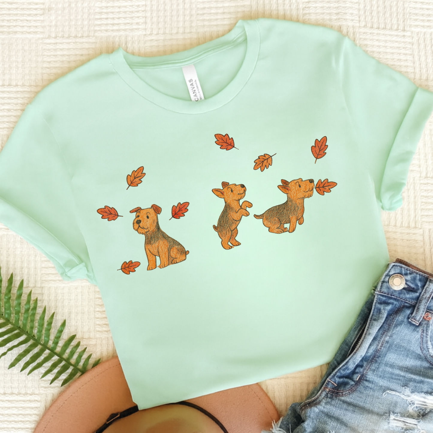 Airedale Terrier Chasing Leaves TShirt Heather Mint