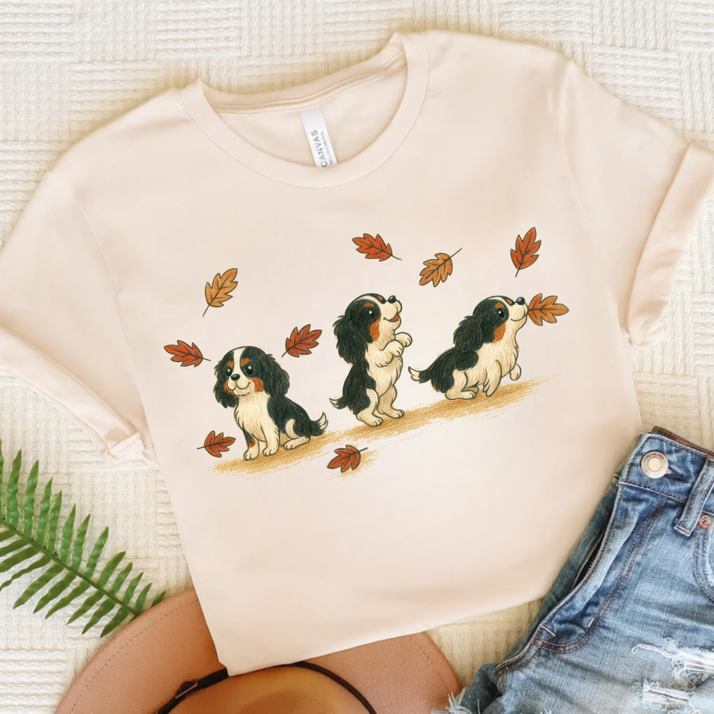 Tricolor Cavalier Chasing Leaves TShirt Natural