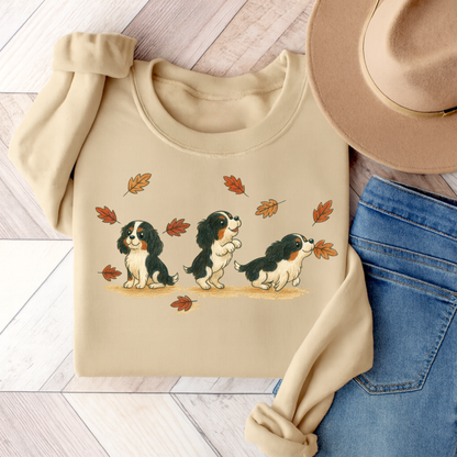 Tricolor Cavalier Chasing Leaves Sweatshirt Sand