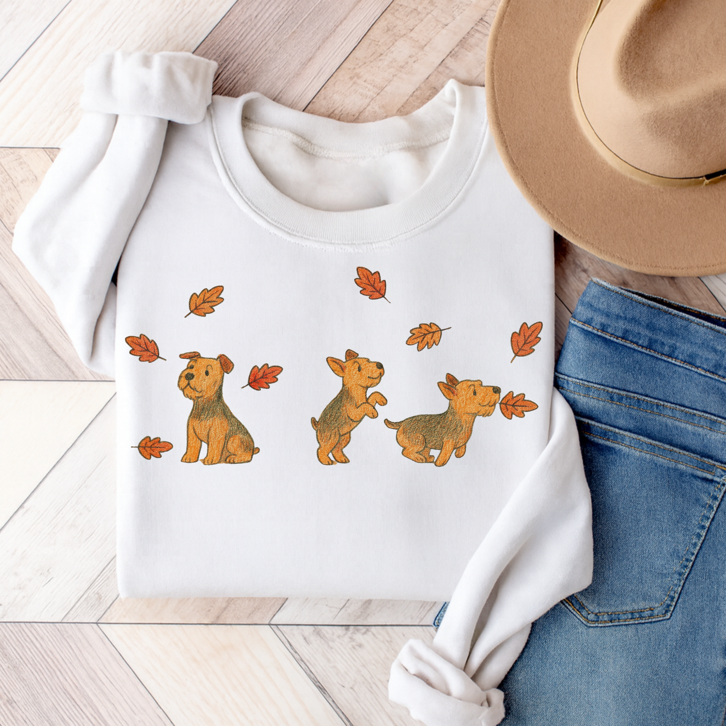 Airedale Terrier Chasing Leaves Sweatshirt White