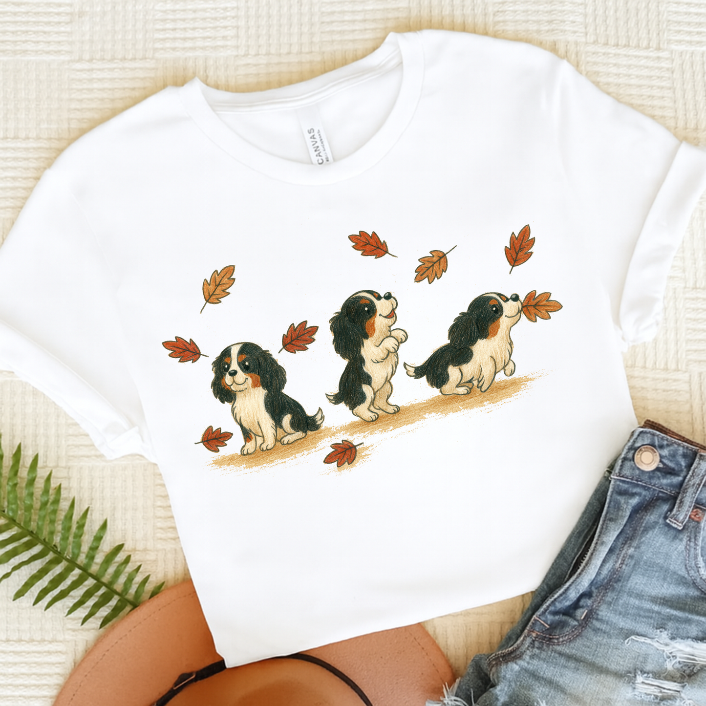 Tricolor Cavalier Chasing Leaves TShirt White