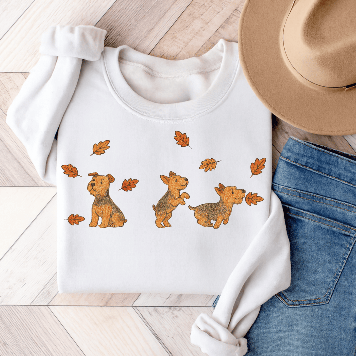 Airedale Terrier Chasing Leaves Sweatshirt White