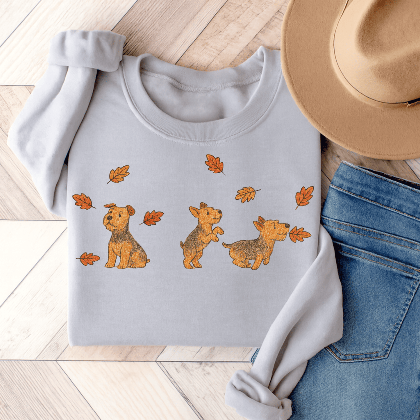 Airedale Terrier Chasing Leaves Sweatshirt Ash