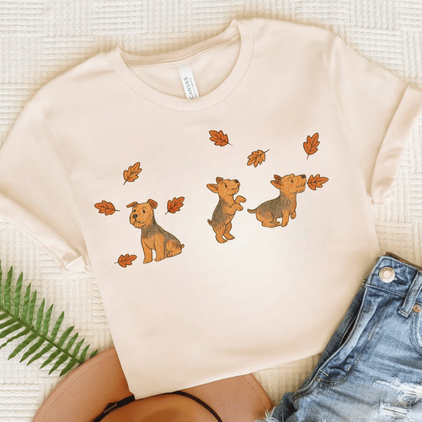 Airedale Terrier Chasing Leaves TShirt Natural