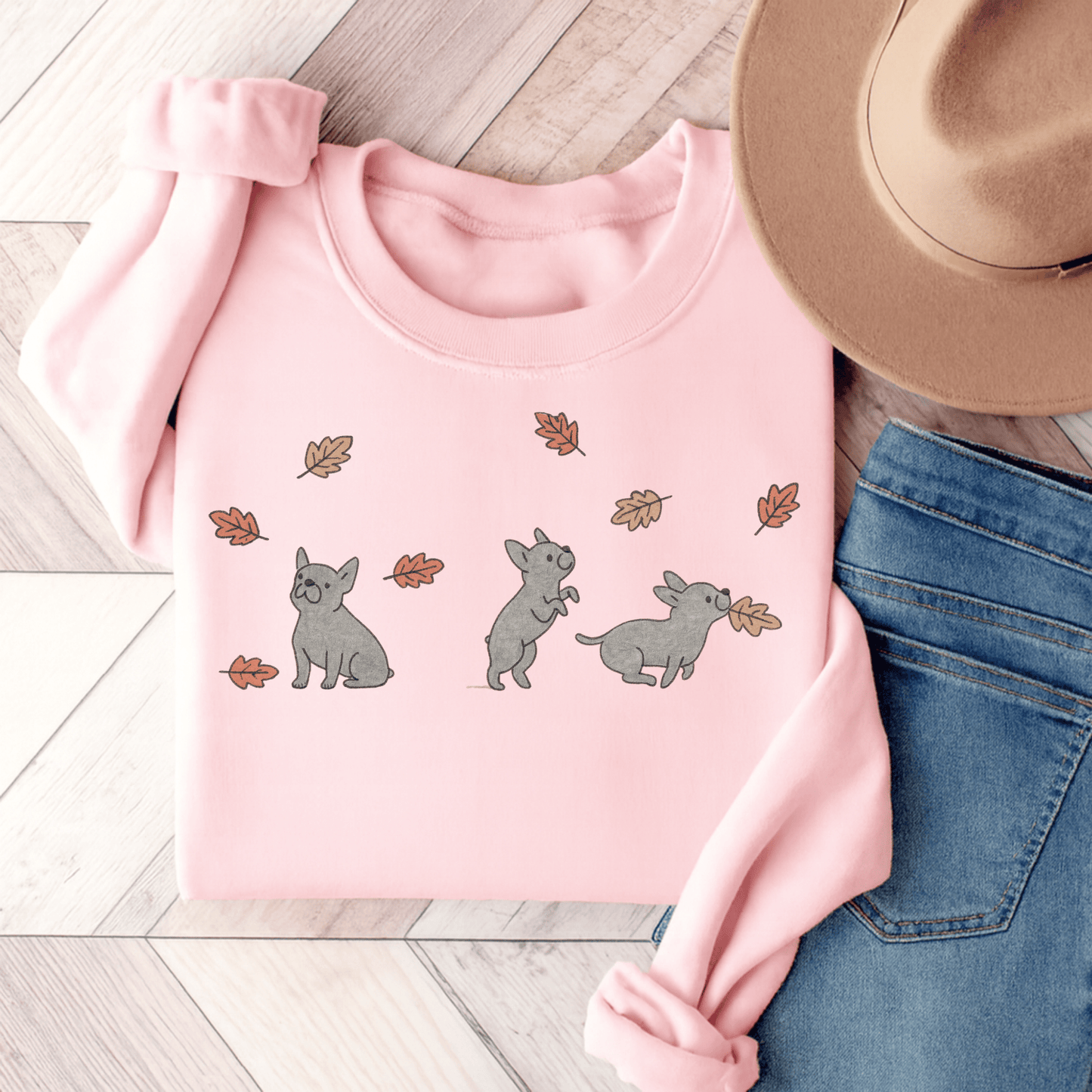Black French Bulldog Chasing Leaves Sweatshirt Light Pink