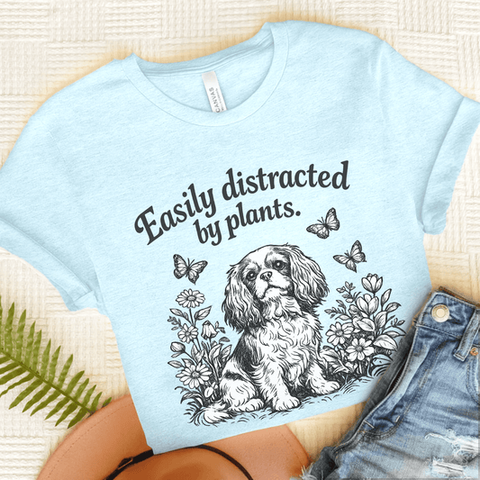 Cavalier Distracted Garden Unisex TShirt Heather Ice Blue
