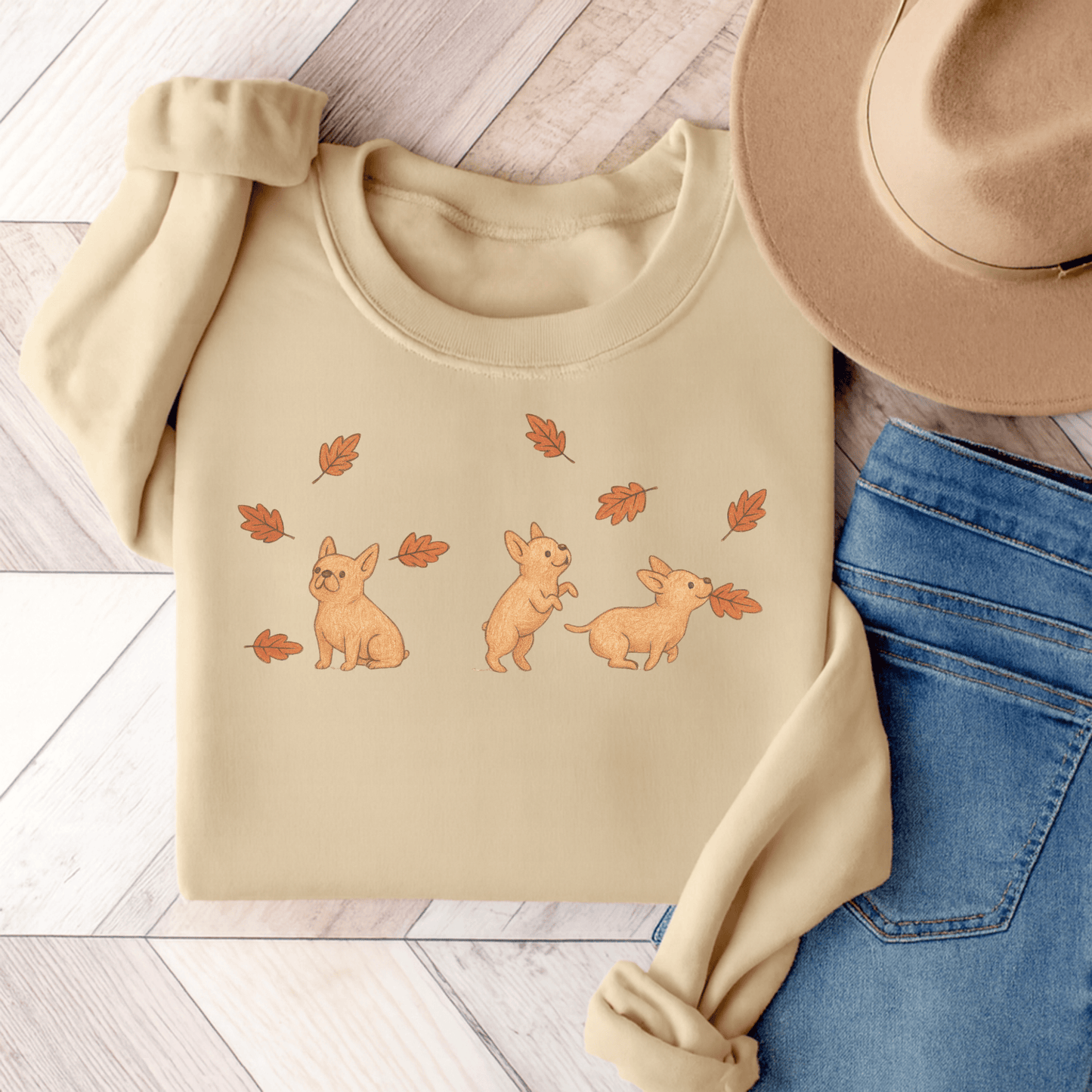 Fawn Frenchie Chasing Leaves Sweatshirt Sand