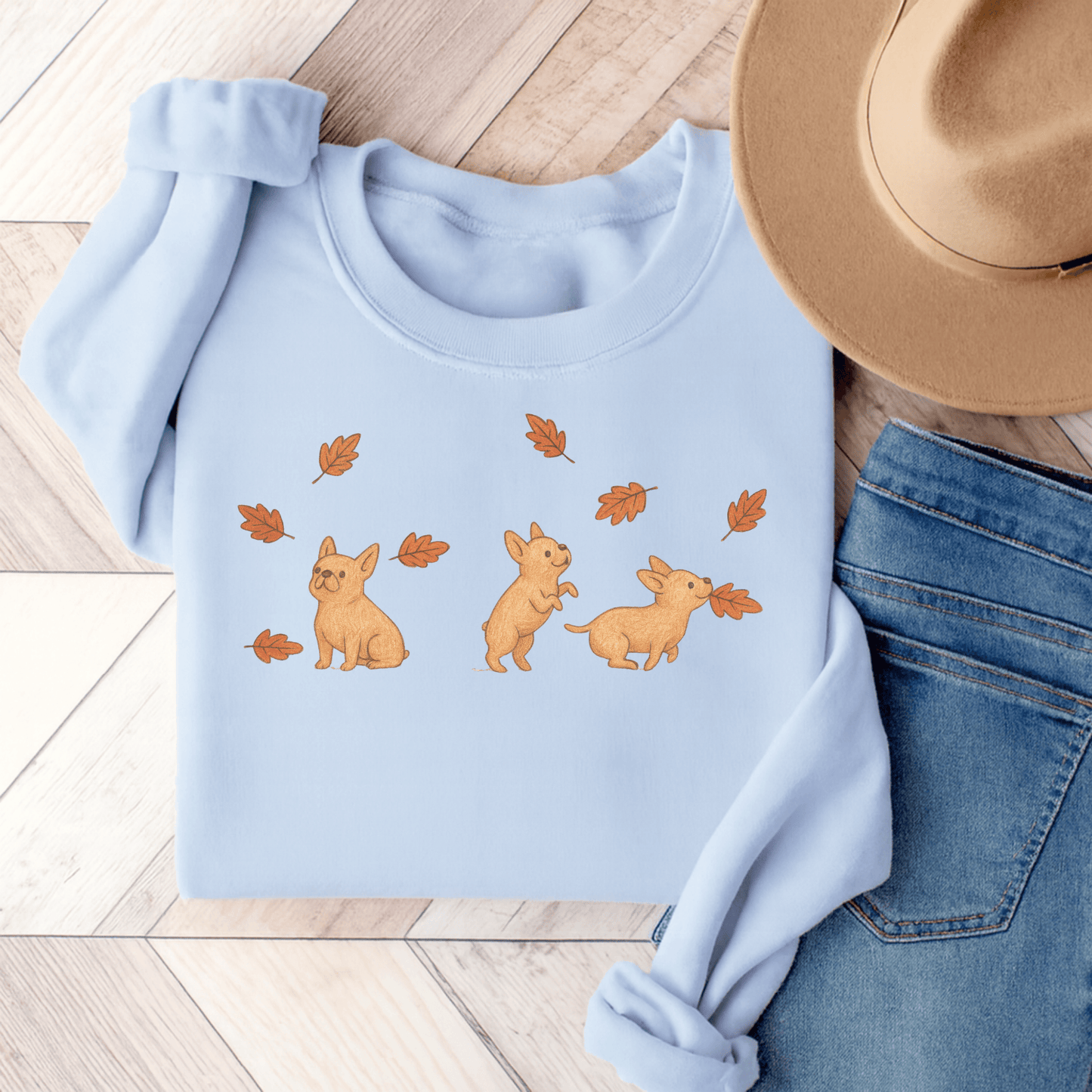 Fawn Frenchie Chasing Leaves Sweatshirt Light Blue