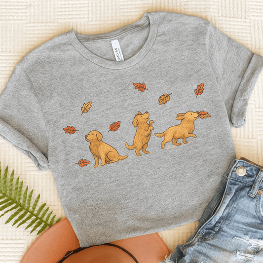 Golden Retriever Chasing Leaves Unisex TShirt Athletic Heather