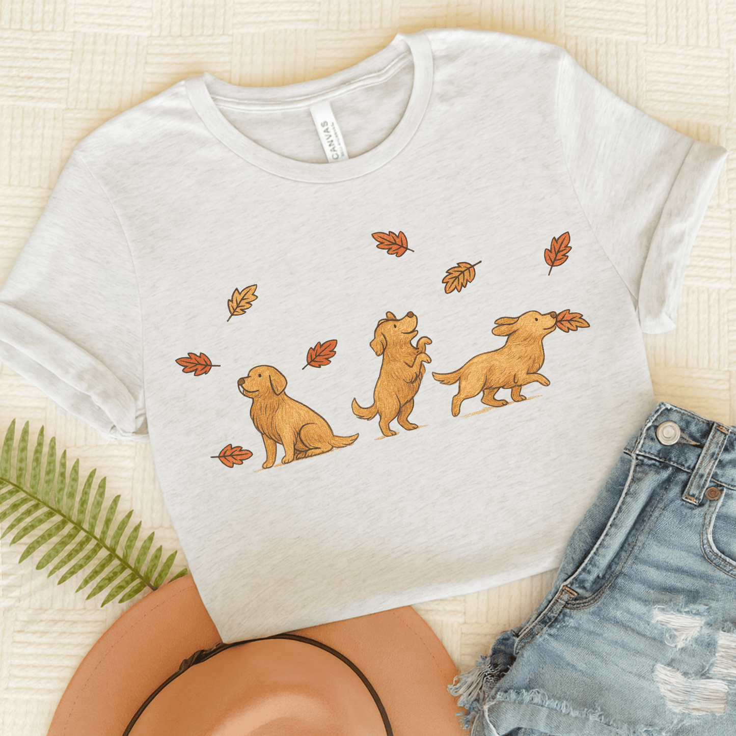 Golden Retriever Chasing Leaves Unisex TShirt Ash