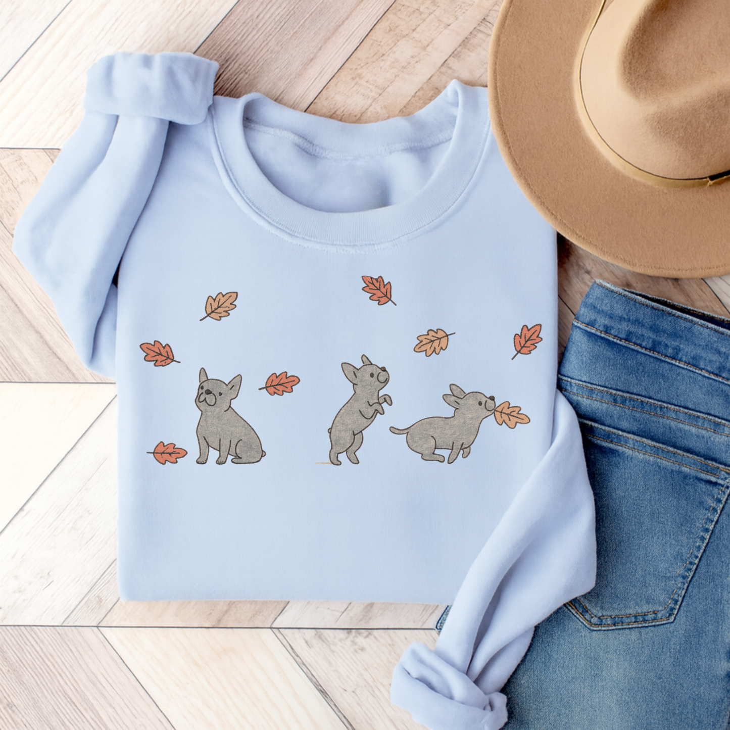 Black French Bulldog Chasing Leaves Sweatshirt Light Blue