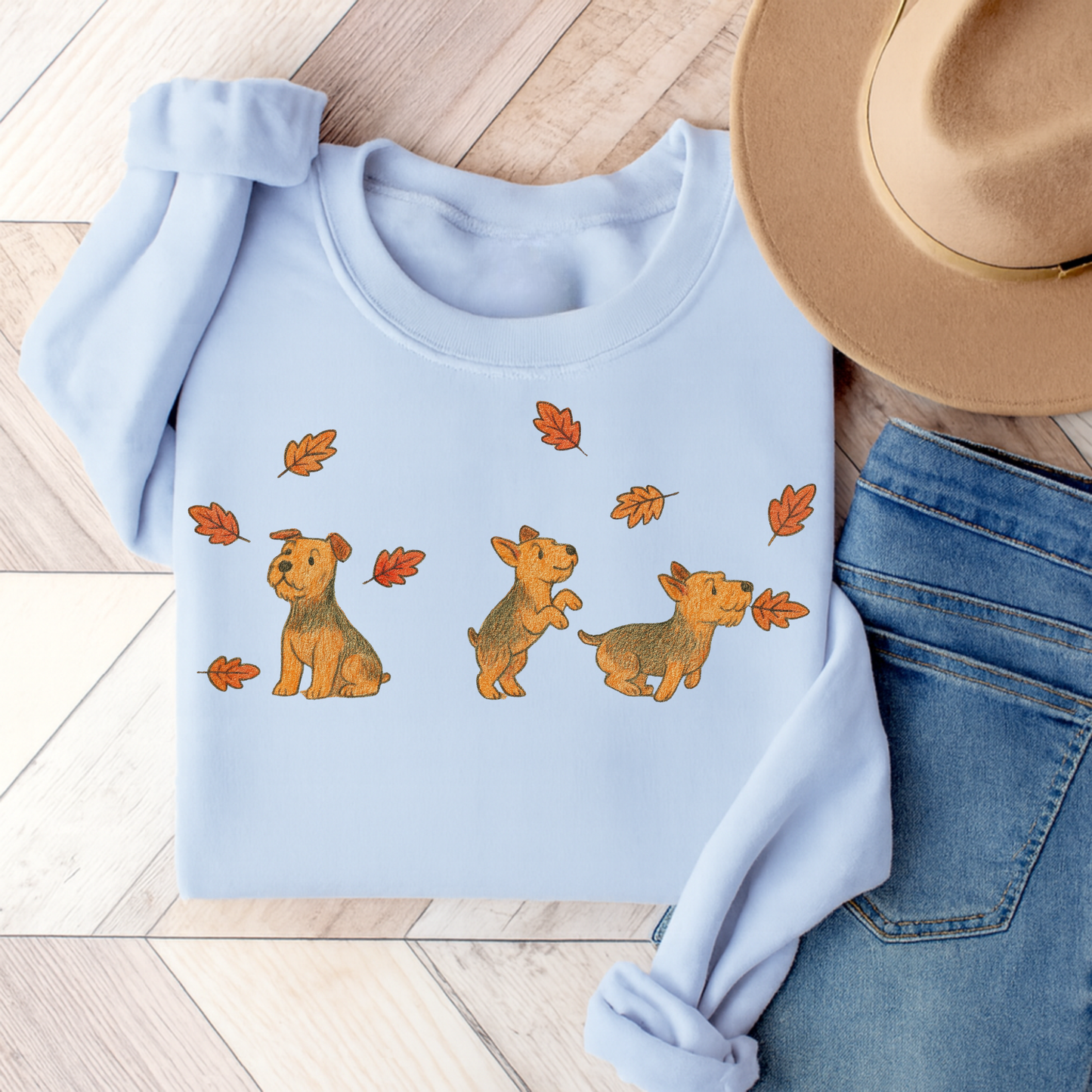 Airedale Terrier Chasing Leaves Sweatshirt Light Blue