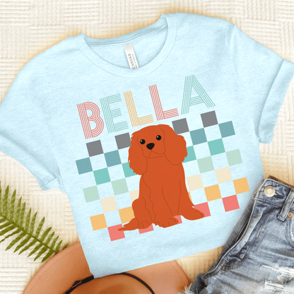 Printify T-Shirt Heather Ice Blue / S Ruby King Charles Checkered Tee